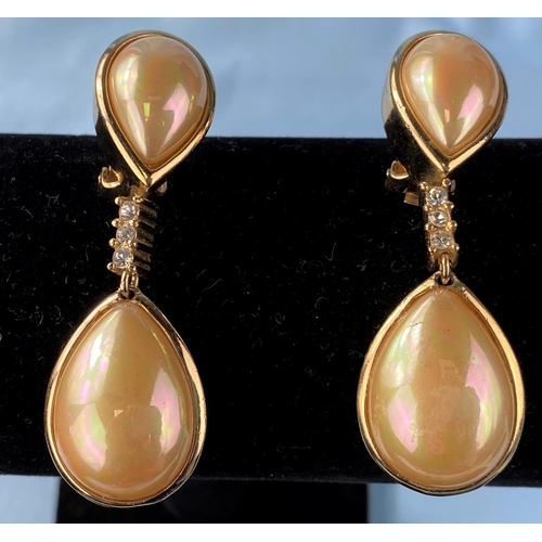 465 - A pair of Christian Dior drop earrings with opal effect centres with gilt surrounds with coloured st... 