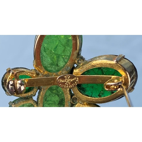 471 - A vintage Christian Dior brooch, various oval jade coloured stones in a gilt setting.