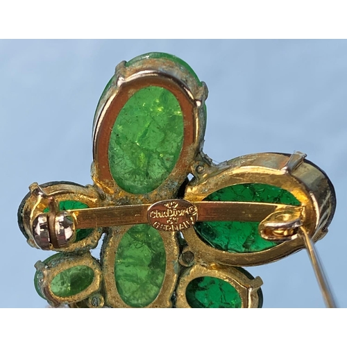 471 - A vintage Christian Dior brooch, various oval jade coloured stones in a gilt setting.