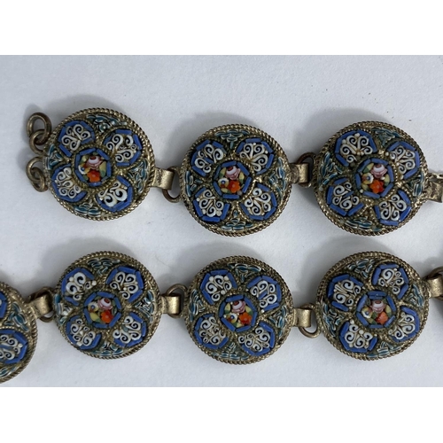 483 - A white metal violin brooch set with stone, a part mosaic bracelet, a gilt owl brooch, three pendant... 