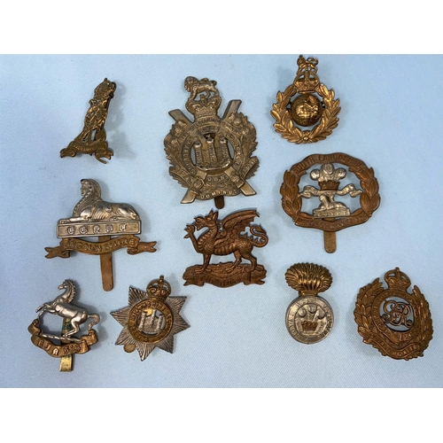 219 - 10 British army cap badges