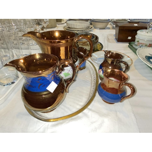 374 - A set of five green glass tumblers with three lines/stripes of dripped blue decoration; other china ... 