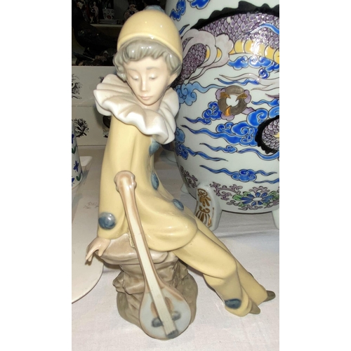 378 - A Nao figure of a clown with lute, a large selection of decorative china including Country Roses, Mi... 