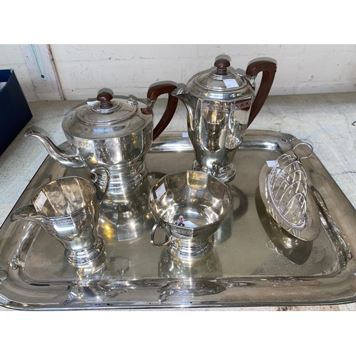 426 - A hallmarked silver 4 piece tea set of octagonal tapering form with chased band to border, Birmingha... 