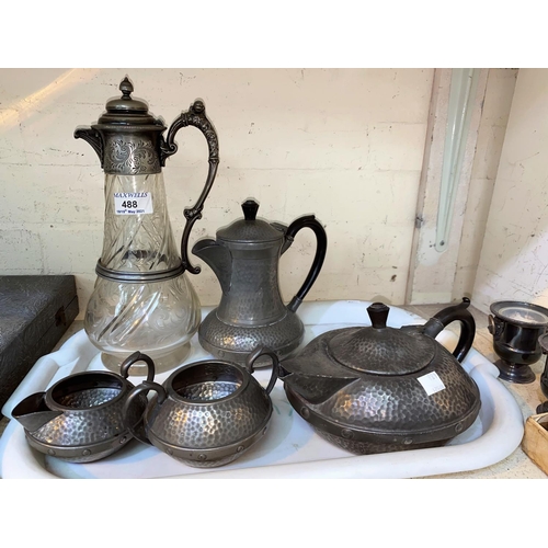 488 - A 19th century glass claret jug with EPBM mounts, a pewter teaset, silverplate cutlery