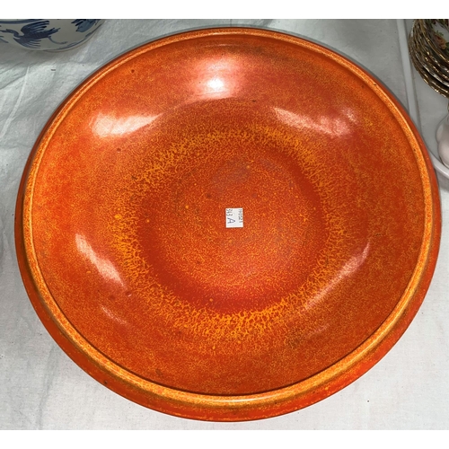 343a - A Pilkington's Royal Lancastrian shallow bowl with mottled orange glaze, impressed and bearing part ... 