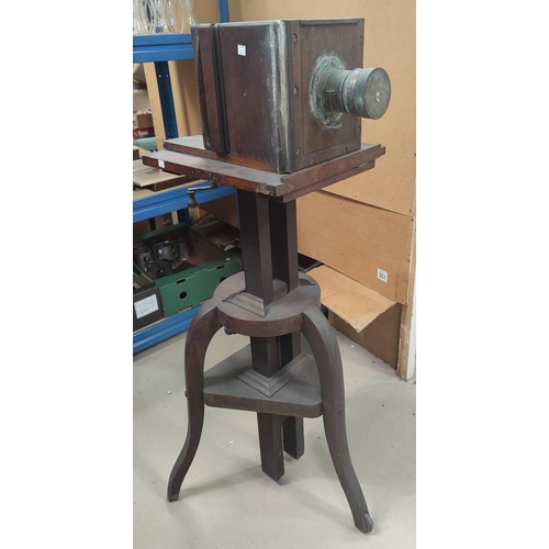 127 - A Victorian mahogany and brass large plate camera on stand (a.f.)