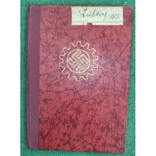 153a - A German Socialist Labour Front membership card signed and dated 1938 and stamped up to 1944