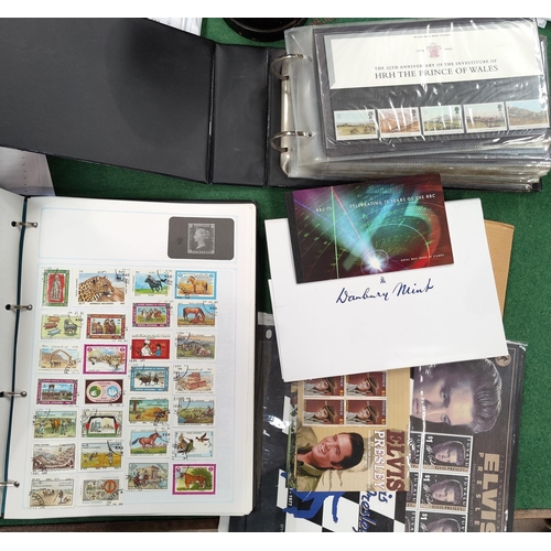 231 - An album of world stamps, an album of GB mint commemoratives in packets (approx 30 packs) etc, vario... 