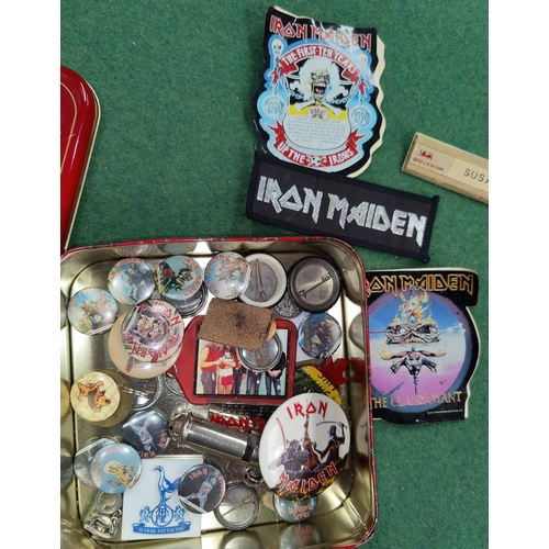 239 - A collection of Iron Maiden badges