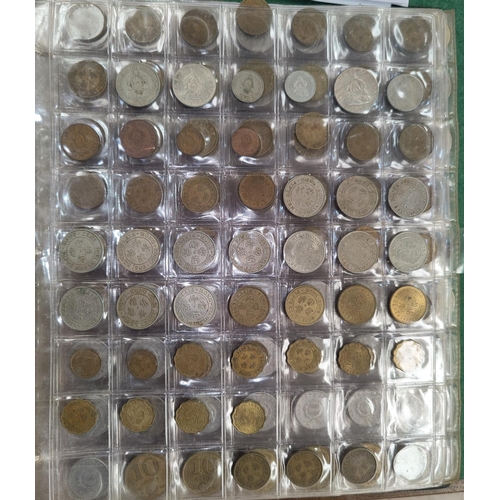 250 - A collection of world coins in album around 850 examples from Japan, Jamaica, Hong Kong, Lebanon etc