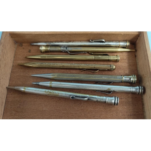 413 - Various vintage silvered and gilt cased pencils