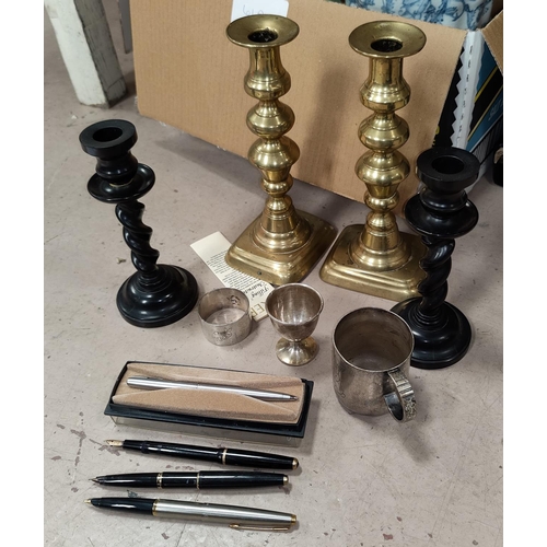 61A - 4 Parker fountain pens, a silver egg cup, a pair of brass candlesticks, a pair of ebony candlesticks... 