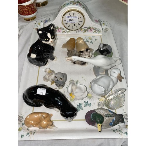 358 - A collection of china animals; a mantel clock
