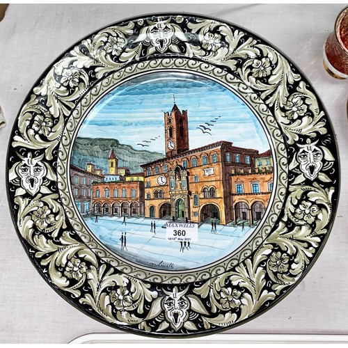 360 - A continental large pottery wall plaque:  town square scene; a Poole vase; decorative china and glas... 