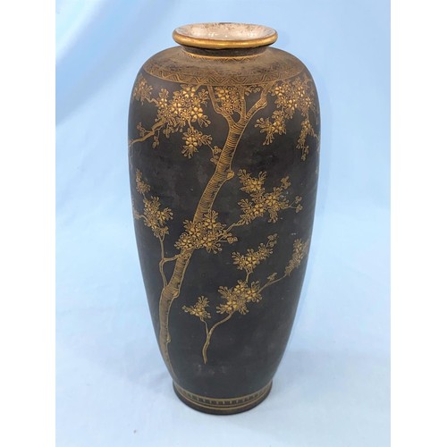 390 - A meiji period Japanese Satsuma vase with fine gilt decorations of trees and birds on a black backgr... 