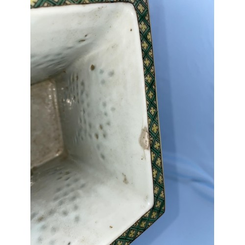 390B - A Chinese Famille Vert flattened squared vase with four panels of decoration with people playing or ... 