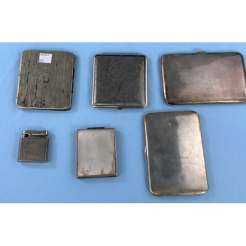 493 - A hallmarked silver compact, London 1946; a vintage cigarette lighter and various cigarette cases