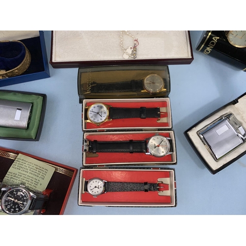 452 - Seven unused wristwatches in original boxes; 2 unused Ronson lighters in original boxes; a simulated... 