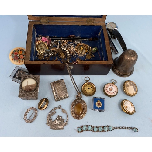 490 - A 19th century rosewood jewellery box containing a silver hand bell (a.f.); costume jewellery; watch... 