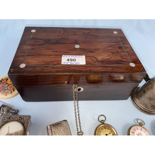 490 - A 19th century rosewood jewellery box containing a silver hand bell (a.f.); costume jewellery; watch... 