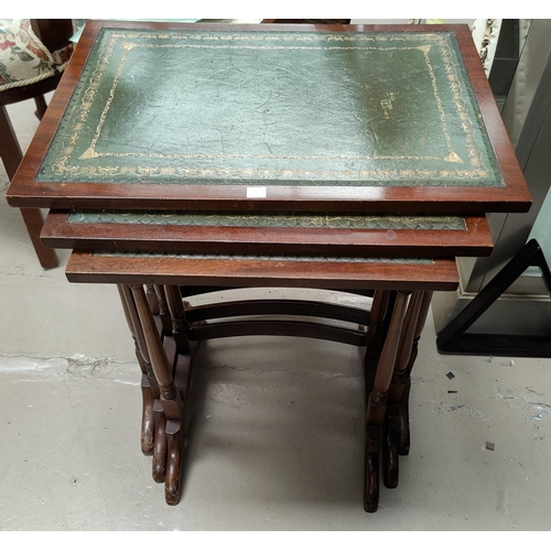 596 - A reproduction mahogany nest of 3 trio tables; a wine table with octagonal top