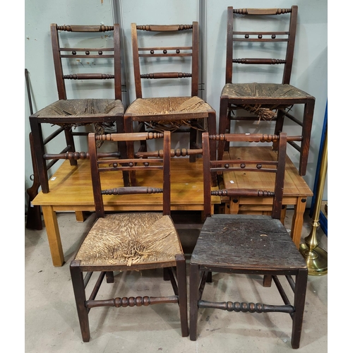 720 - A set of 5 'Country Regency' elm and beech rush seat dining chairs with turned top and bottom rails ... 