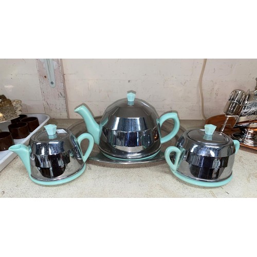 509 - A selection of silver plate and a vintage chrome and turquoise tea set including silver vesta, silve... 