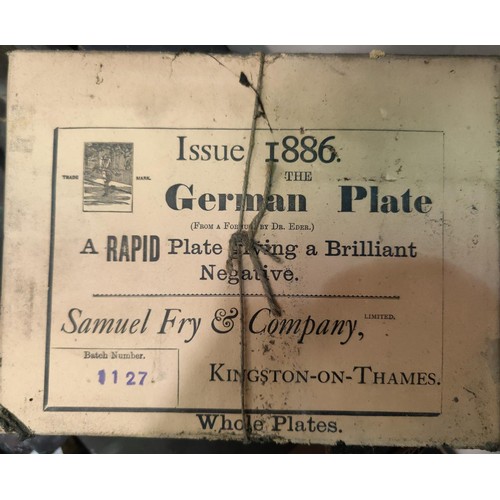 127B - A large selection of negatives on glass, items used with antique cameras