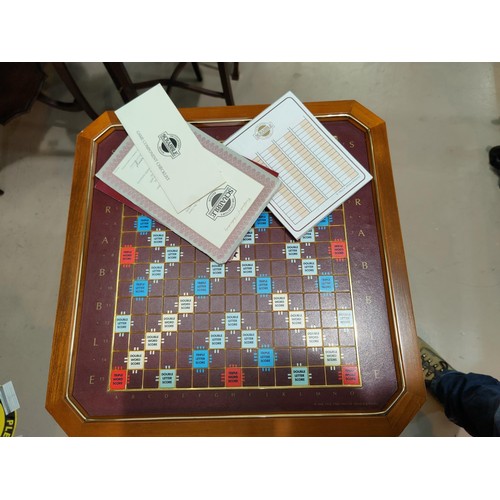 113 - A limited edition Scrabble game table on pedestal base