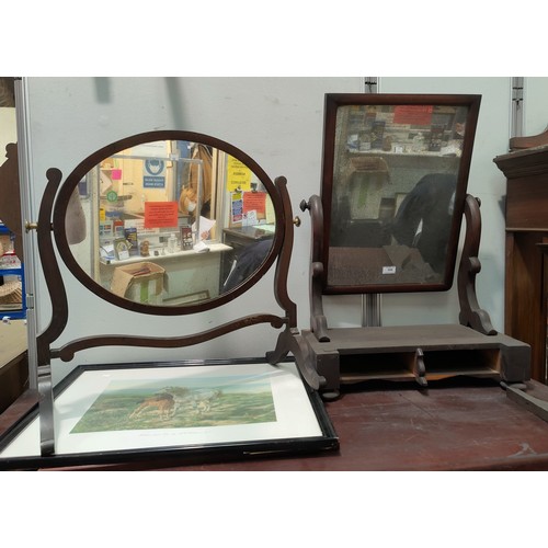 592 - Two dressing table mirrors in free standing mahogany frames