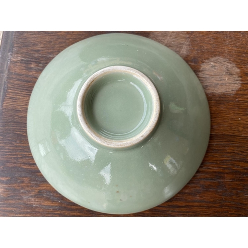 440 - A Chinese celadon glaze dish with incised floral decoration to the interior, diam 22.5cm (3 minor ch... 