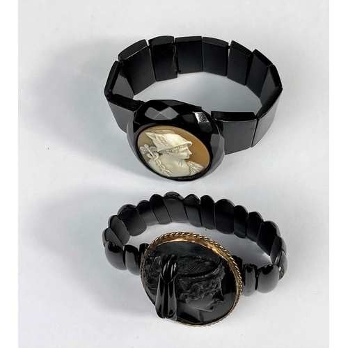 485 - A Victorian jet bracelet set oval shell cameo plaque depicting Hermes; a similar bracelet with jet c... 