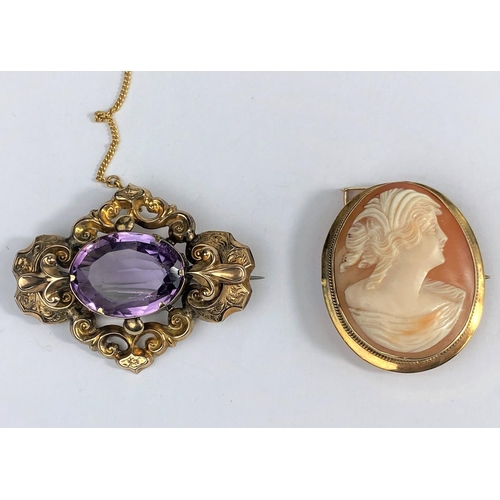 486 - A Victorian gold hollowware brooch set oval amethyst, tests as 9 ct; a shell cameo in gold frame, st... 