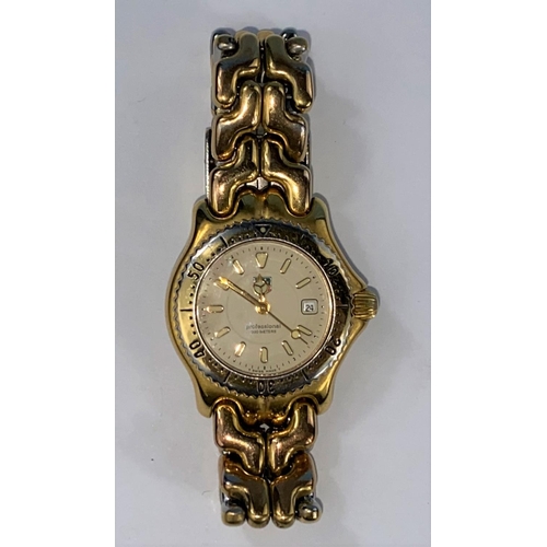 532 - A lady's modern Tag Heuer Professional 200m gilt/stainless steel wristwatch on bracelet strap (gilt ... 