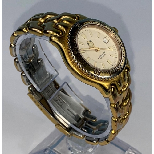 532 - A lady's modern Tag Heuer Professional 200m gilt/stainless steel wristwatch on bracelet strap (gilt ... 