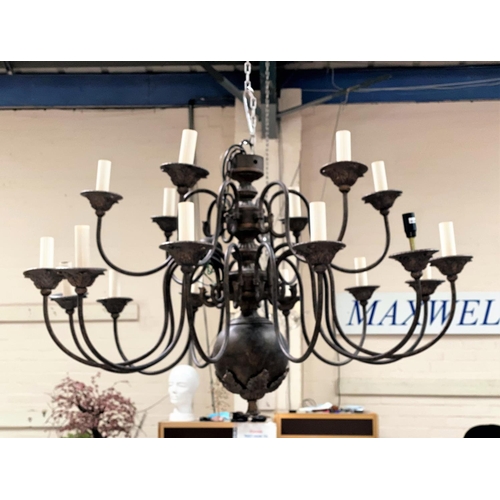 642 - A large impressive modern bronze effect 18 branch chandelier, two tiers, on of 12 and one of 6, heig... 