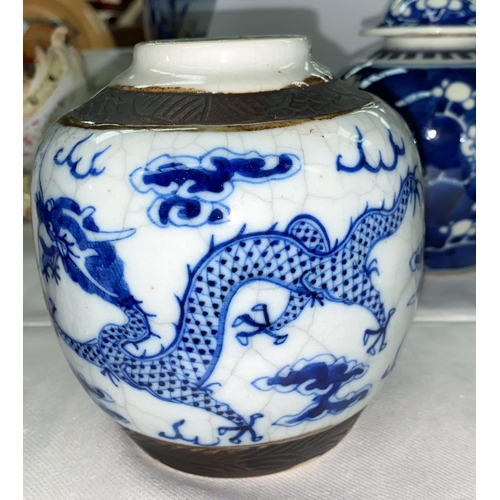 362 - A Chinese blue & white ginger jar and cover, 18 cm (chipped); a matched pair, similar (no covers)