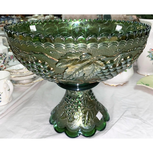 369 - An impressive Carnival Glass table centre green fruit bowl, molded fruiting vine decoration, diamete... 