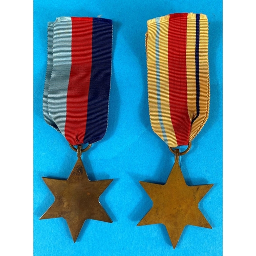 93 - A WWII group of 4 medals including The African Star with medal slip in box to Lieutenant R.T.Jackson