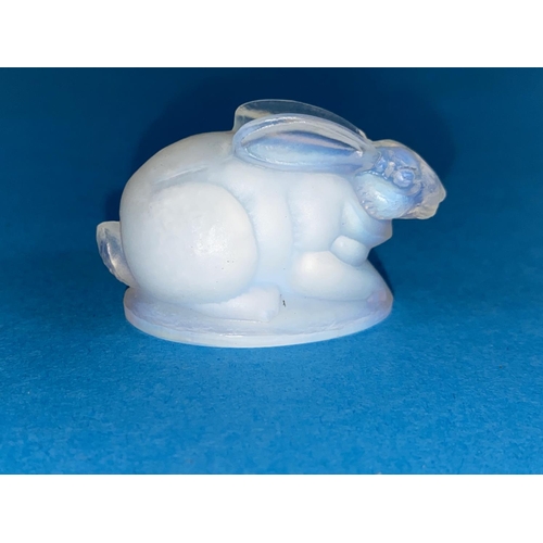 390 - A French opalescent glass rabbit signed Sabino to base