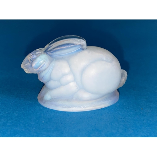 390 - A French opalescent glass rabbit signed Sabino to base