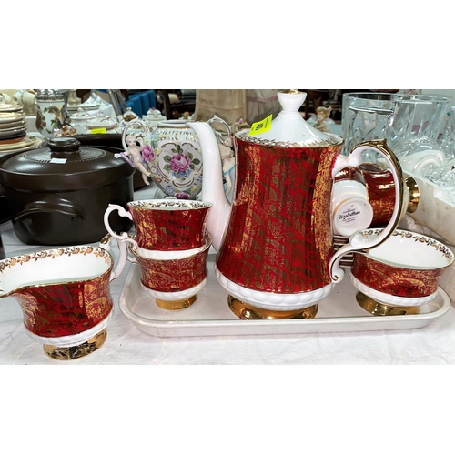 400 - An Elizabethan red and gilt part tea set; a Poole vase; a pair of encrusted sleigh vases in the Dres... 