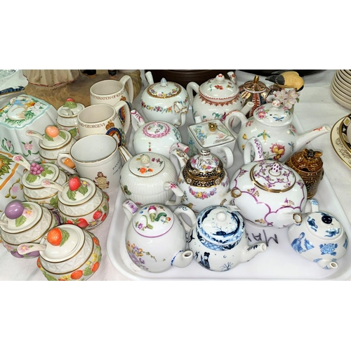 408 - A selection of miniature teapots and decorative china