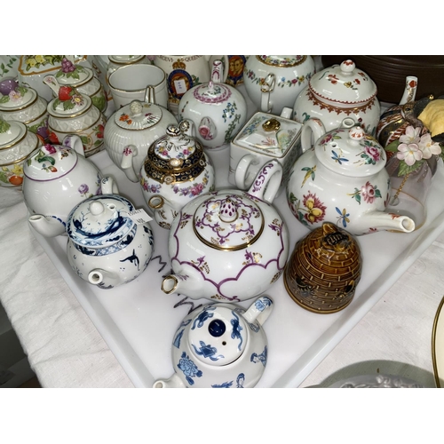 408 - A selection of miniature teapots and decorative china