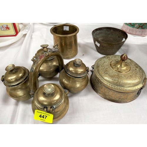 447 - A Indian brass 4 section spice holder; a brass and copper Indian betel container and 2 Indian brass ... 