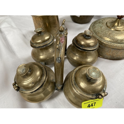 447 - A Indian brass 4 section spice holder; a brass and copper Indian betel container and 2 Indian brass ... 