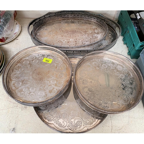 552 - A large oval silver on copper pierced gallery tray, 4 similar trays