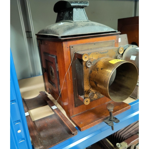 123 - A brass and mahogany magic lantern