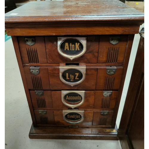 132 - A Victorian Amberg's patent Index Filing cabinet with original card index files to each of the 4 dra... 